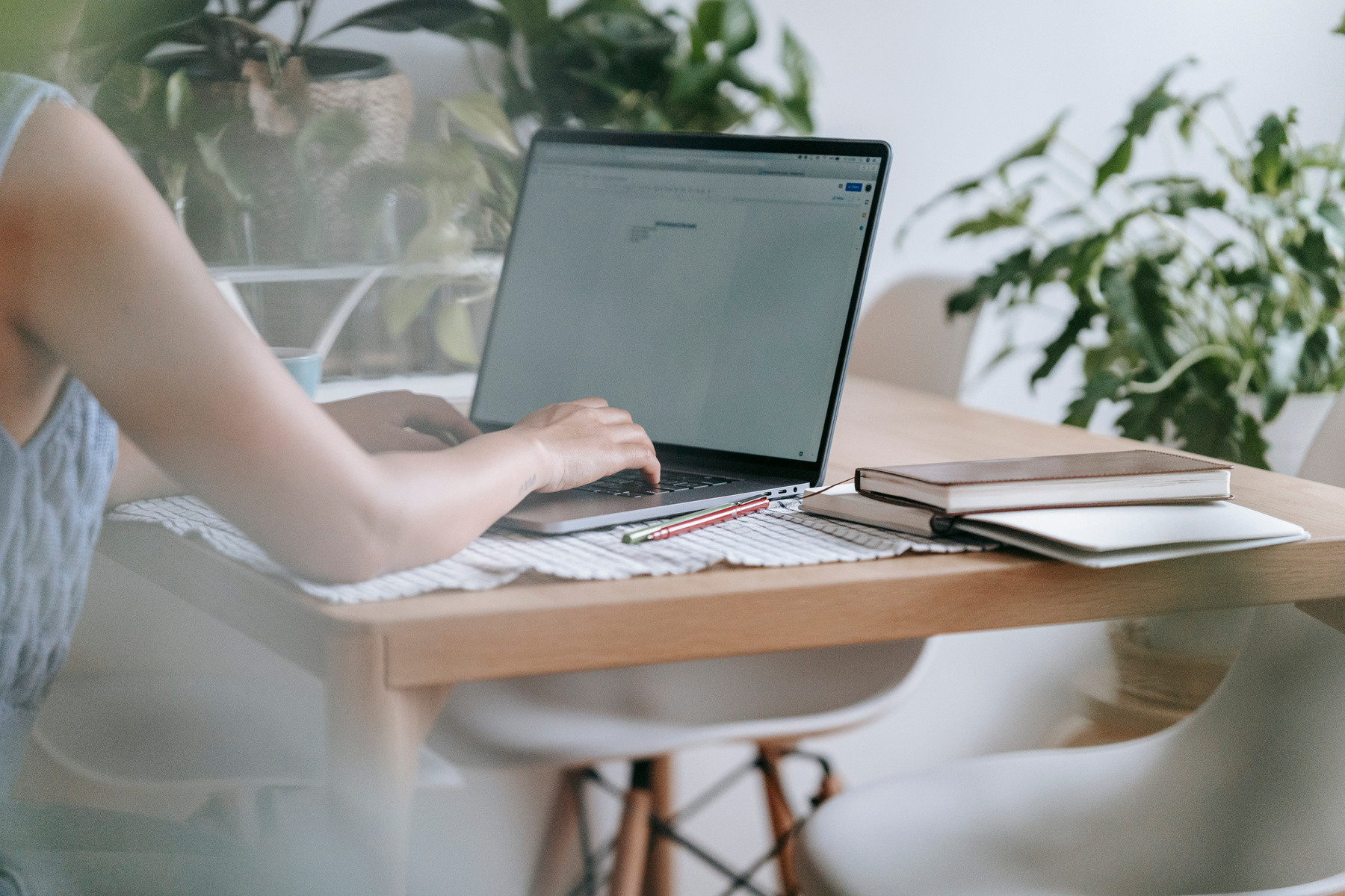 Woman working on laptop at home